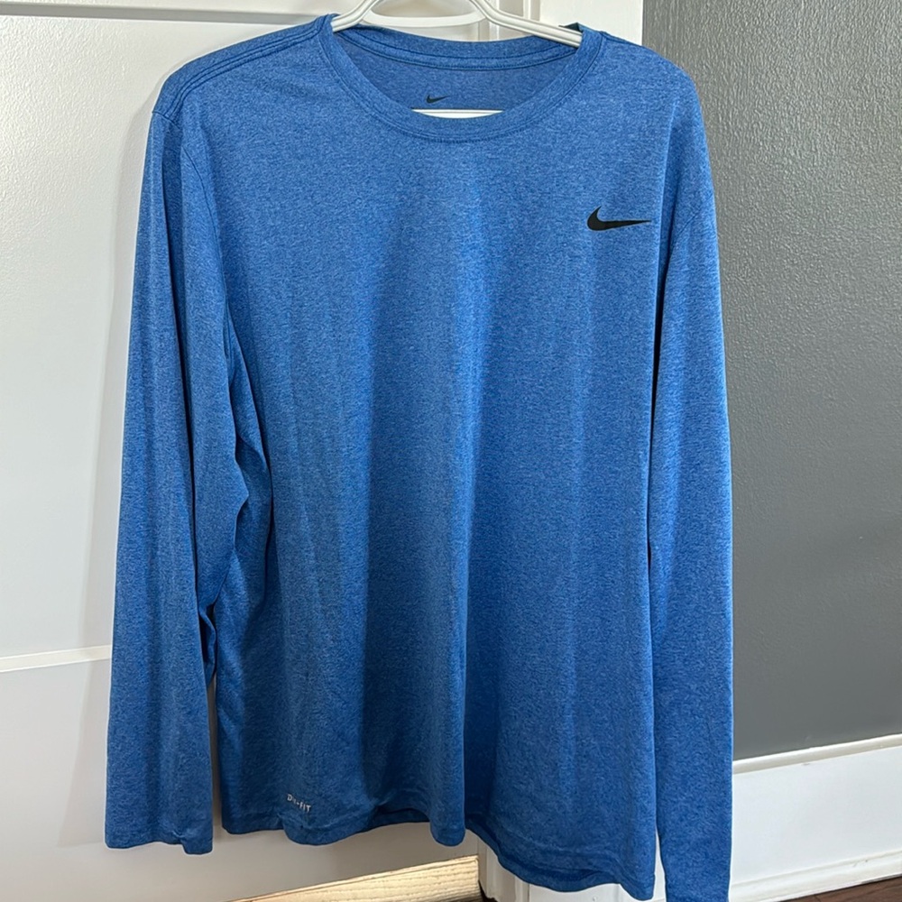 NIKE. Men’s, blue, DRI FIT, long sleeved shirt.